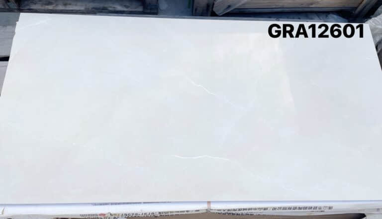 White tile with subtle veining, labeled GRA12601.