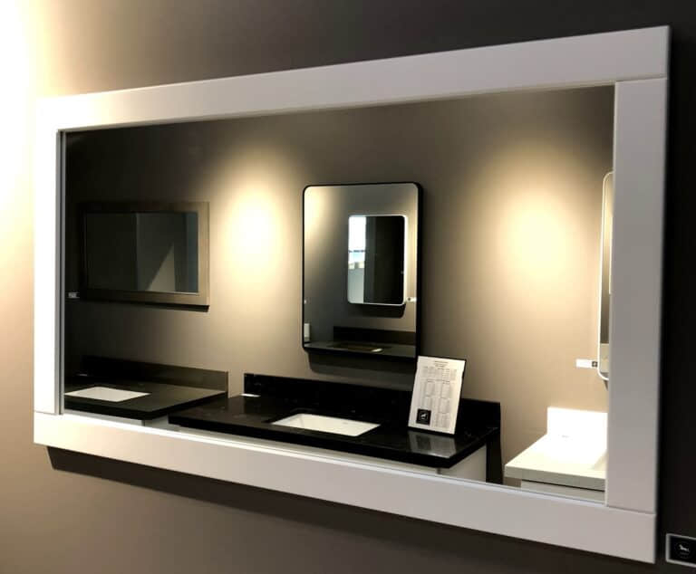 Modern bathroom mirror with integrated lighting and sleek design.