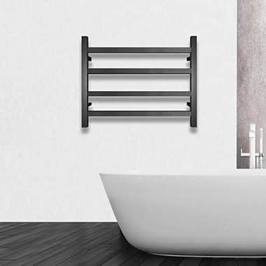 Modern black towel rack above white bathtub in minimalist bathroom.