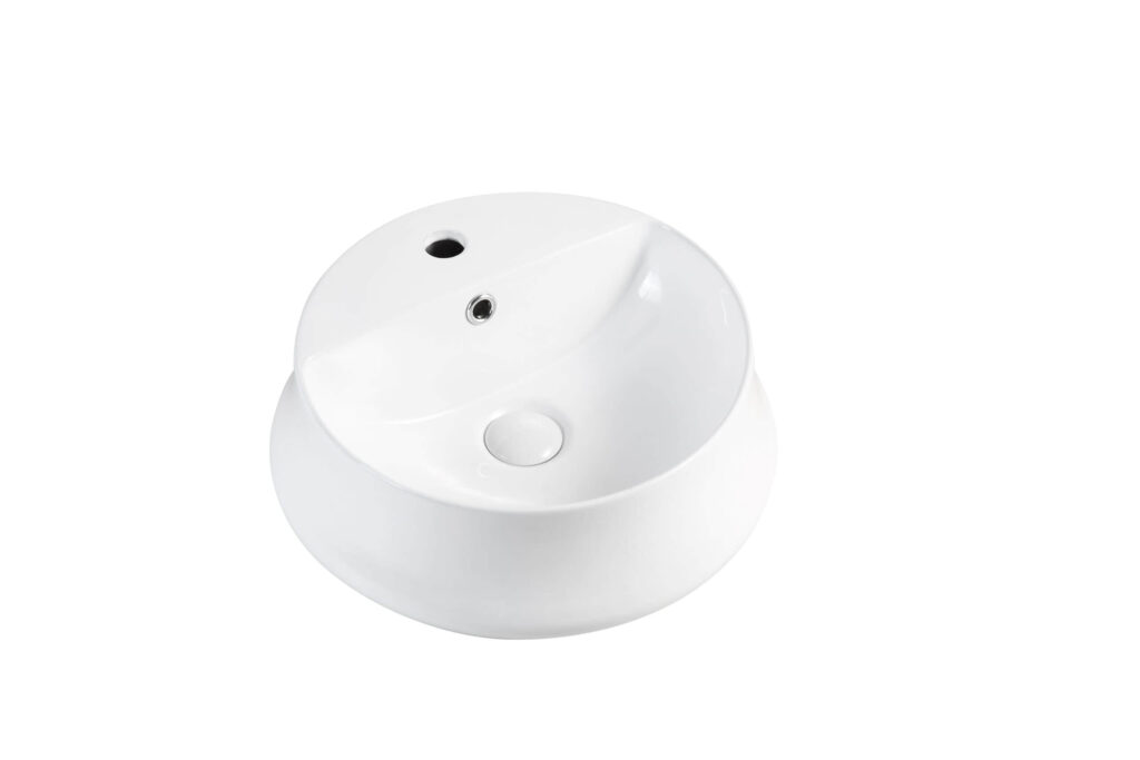 White ceramic bathroom sink with overflow and drain hole.